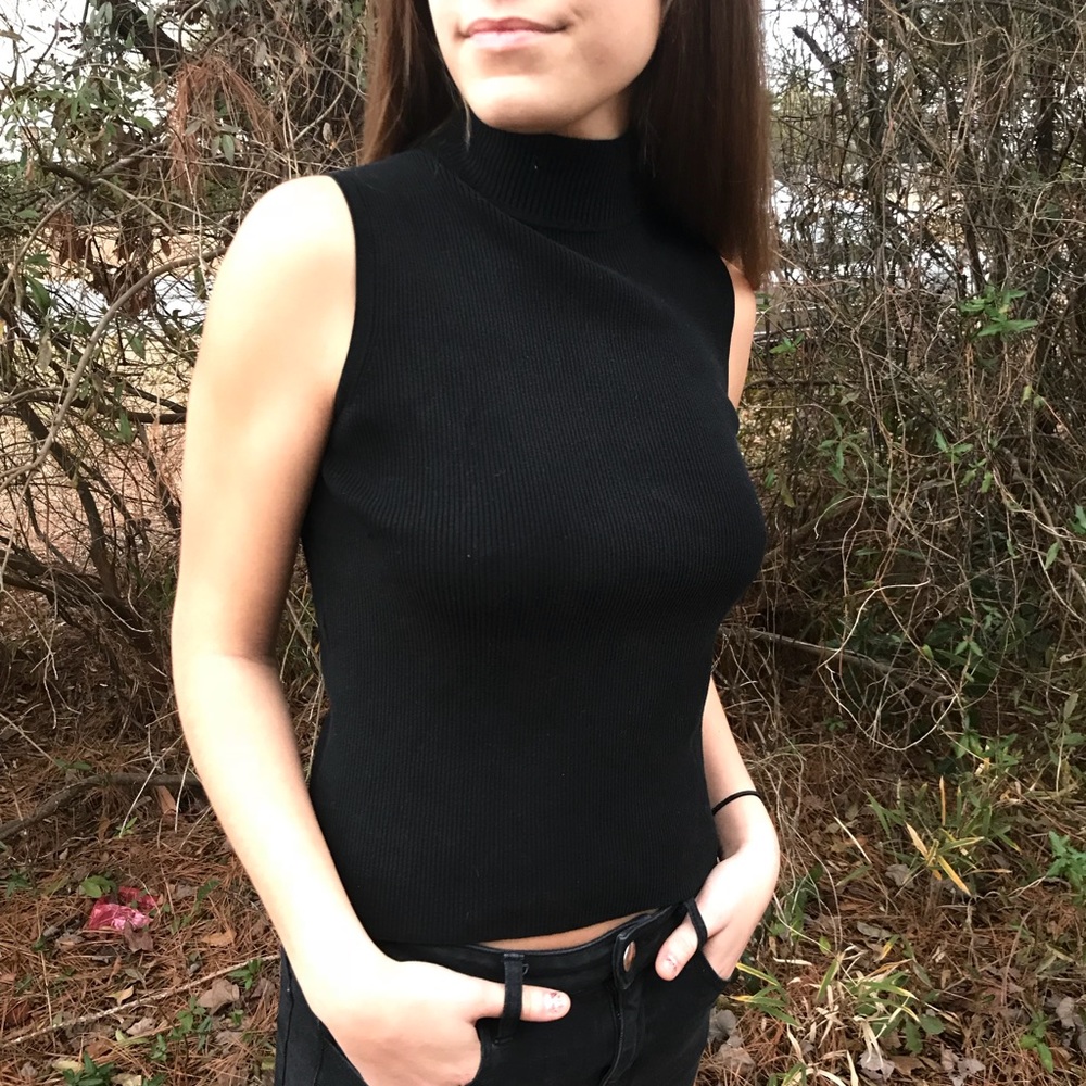Black sleeveless turtleneck